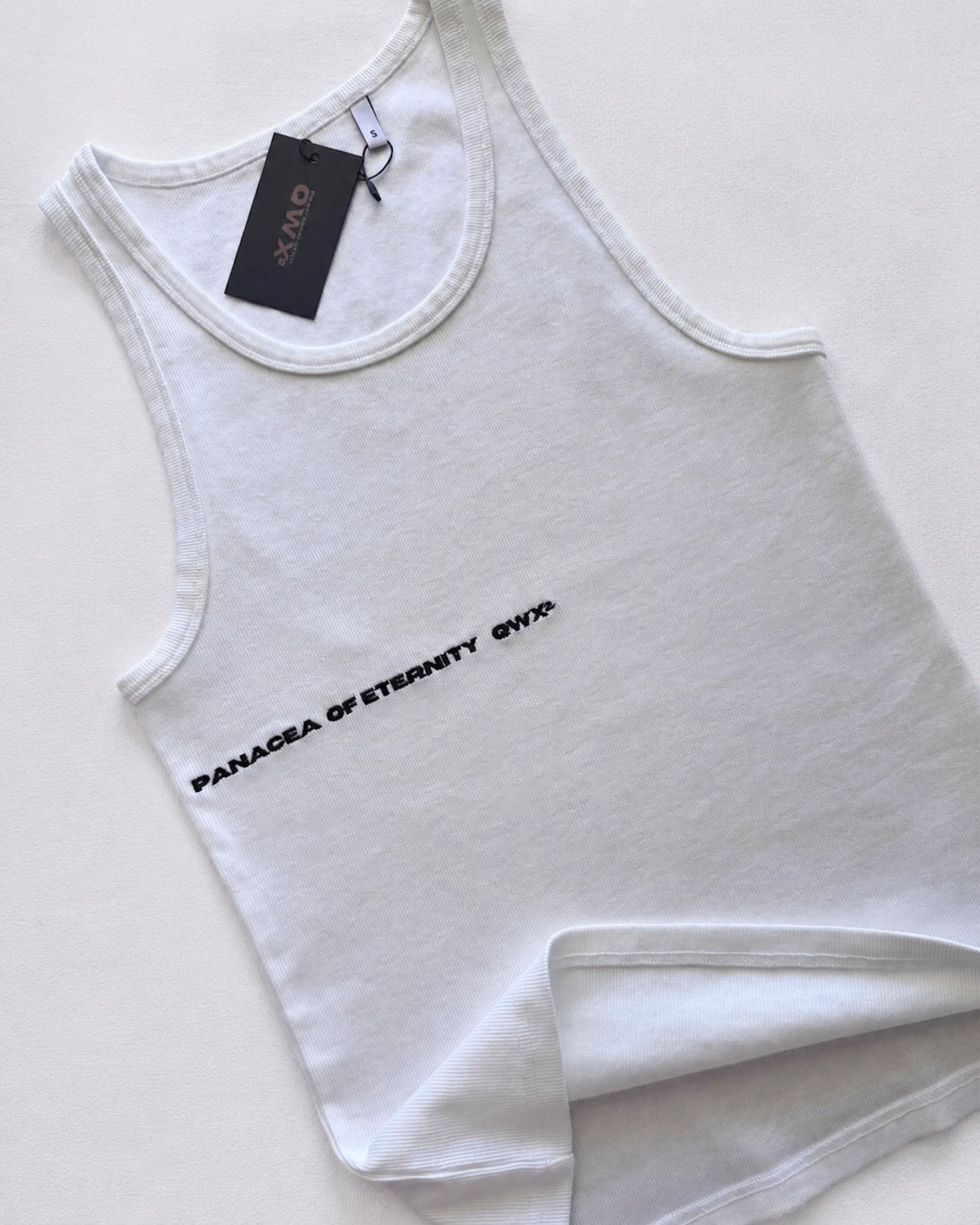CAMISETA DE TIRANTES PANACEA DE LA ETERNIDAD – BLANCO
